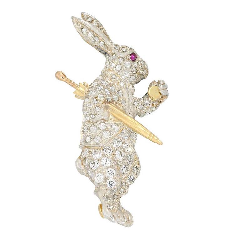 Bentley & Skinner White Rabbit antique jewellery brooch in yellow gold, set with a ruby and 1.10ct of diamonds.